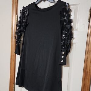 Chic Black Dress with Floral Embellished Sleeves